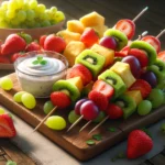 A colorful assortment of fruit kebabs arranged on a platter, accompanied by a bowl of creamy yogurt dip. The kebabs feature chunks of vibrant fruits like strawberries, grapes, pineapple, and melon, skewered on wooden sticks. The yogurt dip is smooth and white, contrasting with the bright hues of the fruits. The arrangement is appetizing and perfect for a refreshing snack or dessert option.